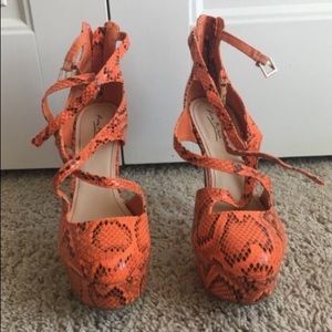 Orange snake skin heels